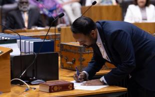 Tanzil Rahman MLA signing