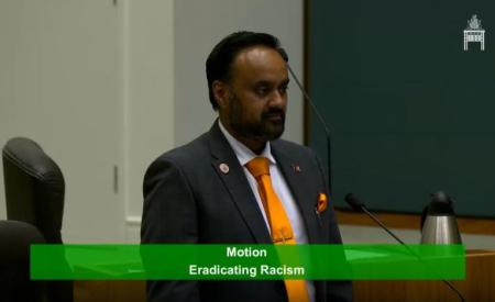 Tanzil Rahman giving a speech