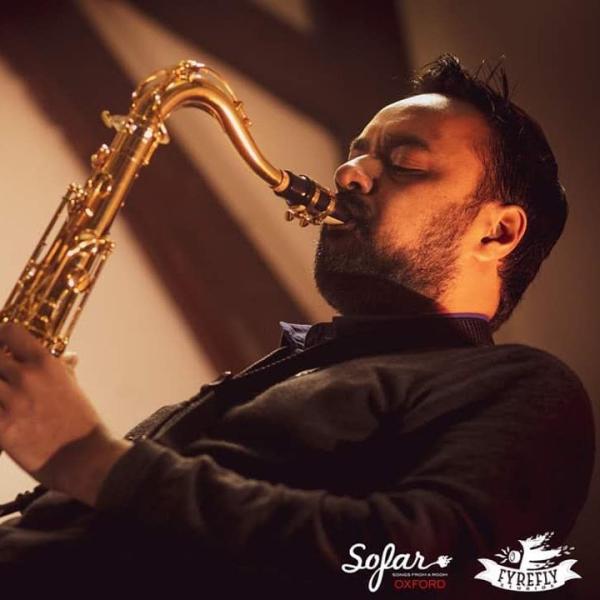 Tanzil Rahman playing saxophone